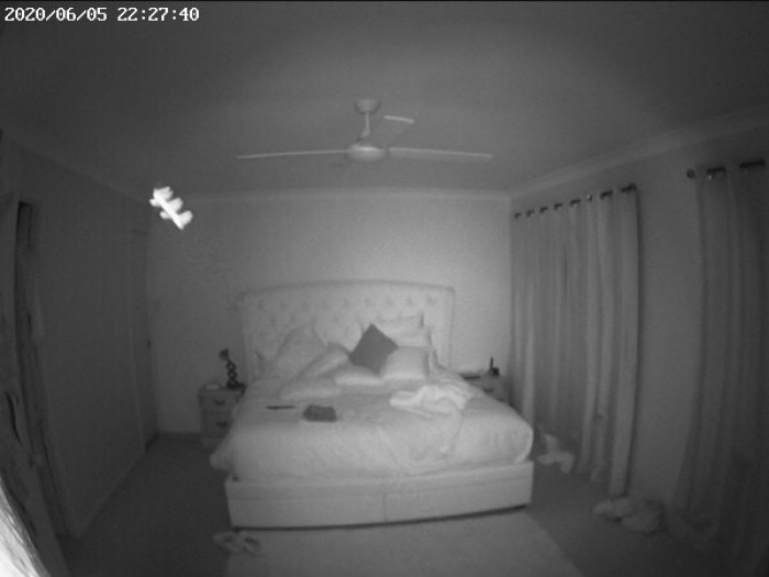 Unexplained lights in bedroom caught on infrared camera